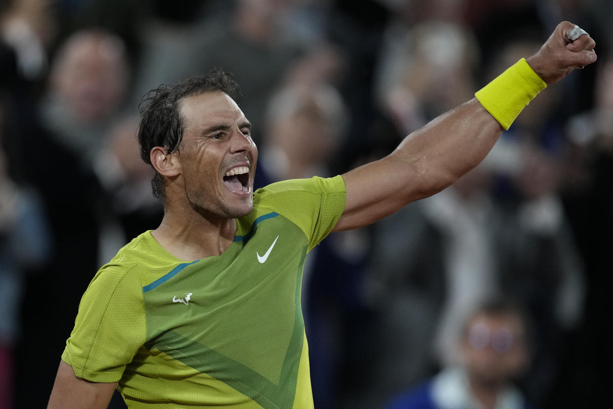 Spain's Rafael Nadal celebrates winning against France's Corentin Moutet in three sets, 6-3, 6-1, 6-4, during their second round match at the French Open tennis tournament in Roland Garros stadium in Paris, France, Wednesday, May 25, 2022. (AP Photo/Christophe Ena)