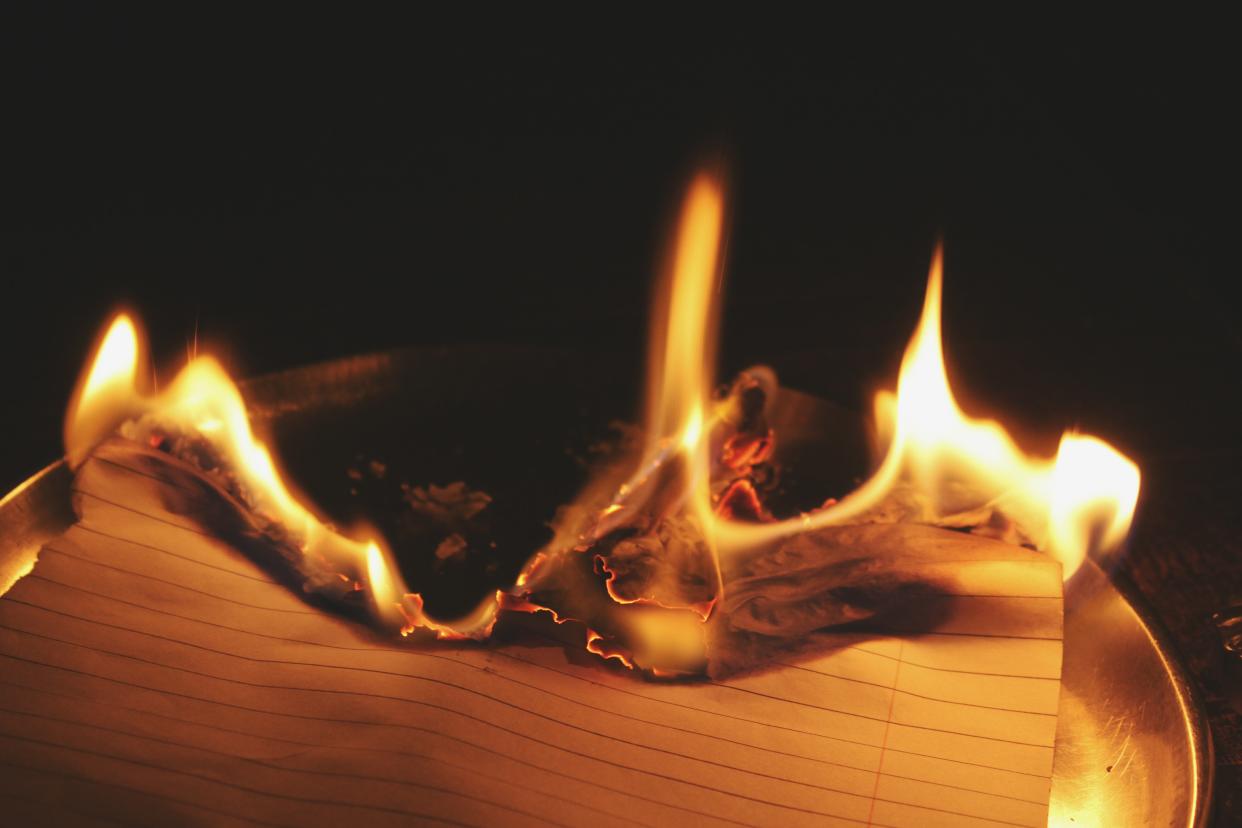 A teen in Nebraska accidentally started a home fire burning letters from her ex. (Photo: Getty Images)