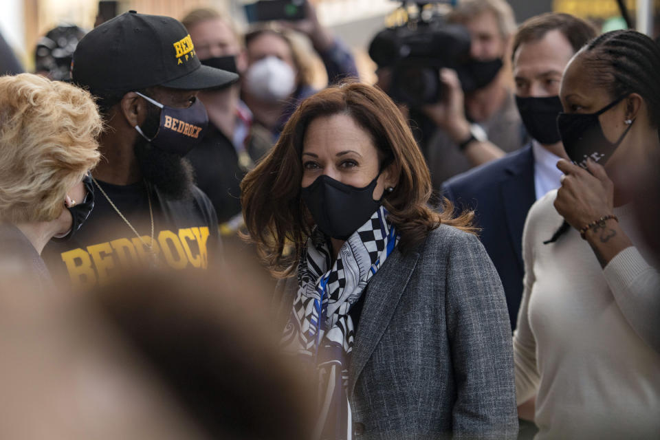 Democratic vice presidential candidate Sen. Kamala Harris, D-Calif., greets supporters as she visits different business that have been impacted by the coronavirus pandemic, Tuesday Sept. 22, 2020 in Flint, Mich. (Nicole Hester/Ann Arbor News via AP)
