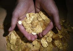 <span class="caption">Divers recently found gold coins from this period at an ancient port in Caesarea, that were produced in Egypt and elsewhere in North Africa. Most of the coins carry the name of Al-Hakim.</span> <span class="attribution"><span class="source">Carla Amit, Israel Antiques Authority</span></span>