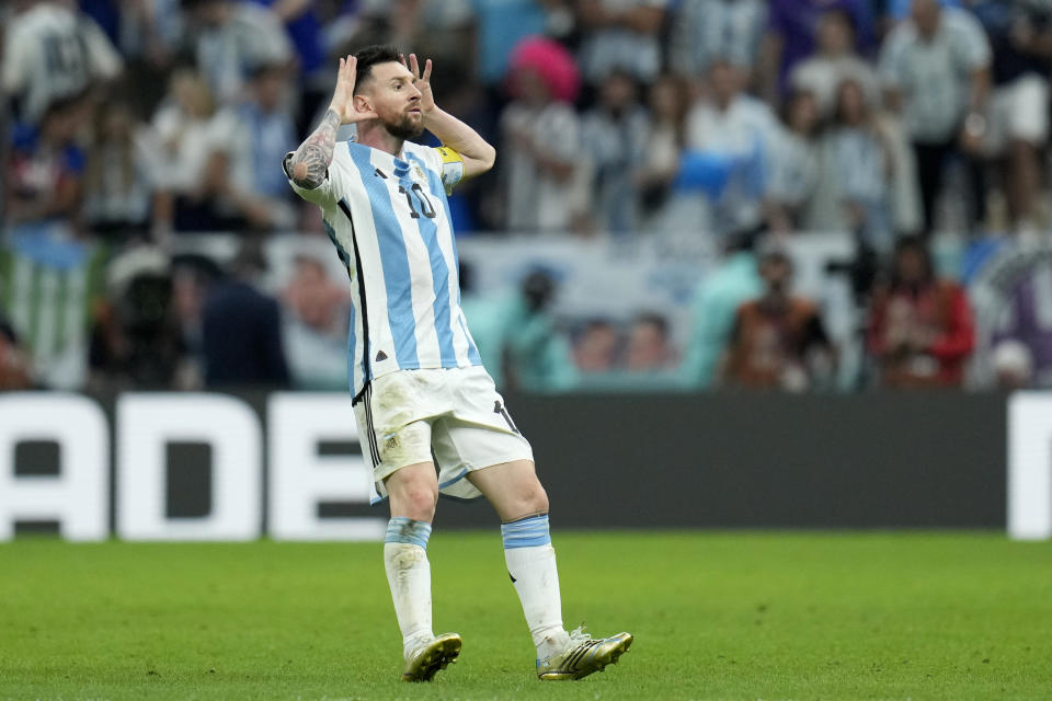 Argentina's Lionel Messi celebrates after scoring his side's second goal from the penalty spot during the World Cup quarterfinal soccer match between the Netherlands and Argentina, at the Lusail Stadium in Lusail, Qatar, Friday, Dec. 9, 2022. (AP Photo/Ricardo Mazalan)