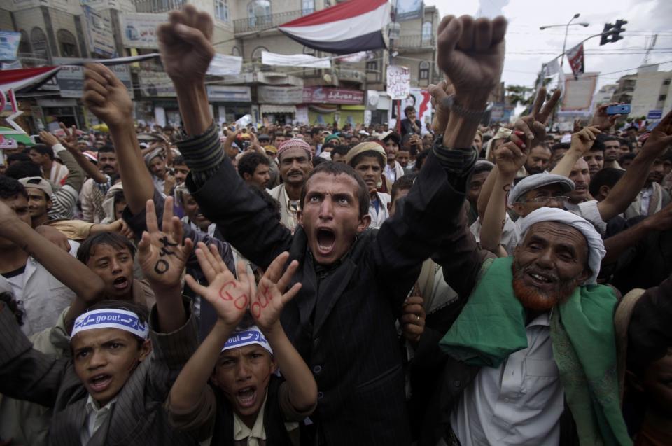 Anti-government protestors demand the resignation of Yemeni President Ali Abdullah Saleh, in Sanaa, Yemen, in April 2011. (Photo: Muhammed Muheisen/AP)