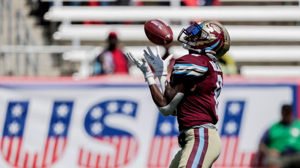 Michigan Panthers wide receiver Joe Walker (8) receives a punt during the second half of a USFL football game against the Houston Gamblers Sunday, April 17, 2022, in Birmingham, Ala. (AP Photo/Butch Dill)