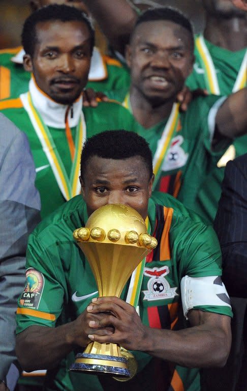 Zambia captain Christopher Katongo kisses the trophy after his side beat Ivory Coast in the final of the African Cup of Nations on February 11, 2012. Unfancied Zambia defeated the mighty Ivory Coast -- Didier Drogba and all -- on penalties in Gabon to claim their first ever Africa Cup of Nations title