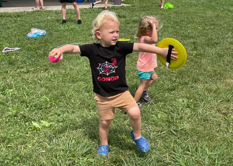 Three-year-old Conor Stephany shows off his terrific pitching stance at the annual Hardin Valley Elementary School Popsicle Party held at the school Sunday, Aug. 14, 2022.