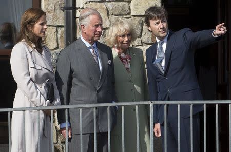 Britain's Prince Charles, Prince of Wales, and Camilla, Duchess of Cornwall, visit Mullaghmore with bombing survivor Timothy Knatchbull and wife Isabella May 20, 2015. Prince Charles visited the site where the Irish Republican Army (IRA) killed his great uncle Lord Mountbatten by exploding a bomb on his boat in 1979. REUTERS/Eddie Mulholland/Pool