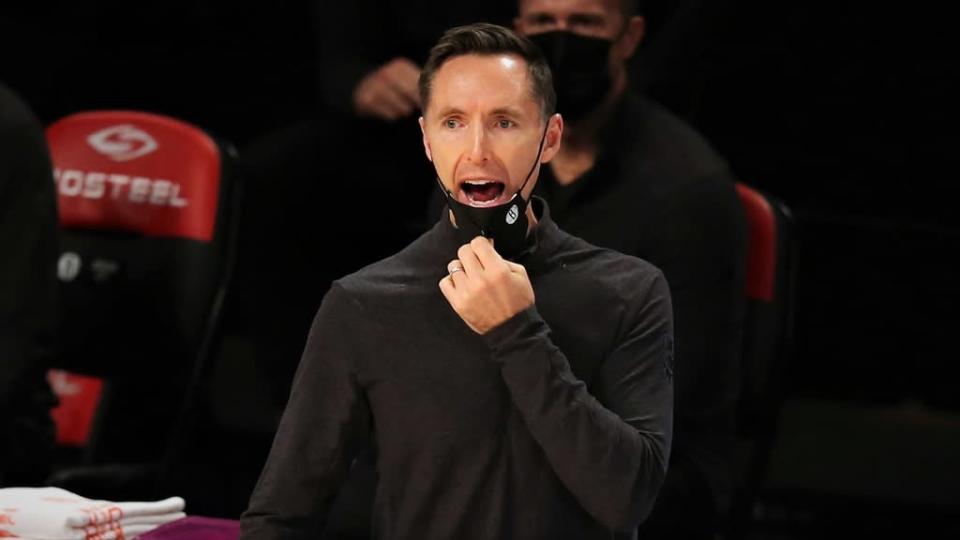 Steve Nash with mask pulled down no opponent visible