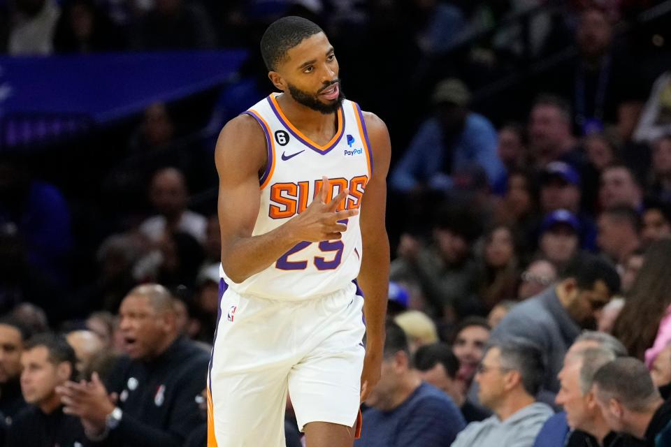 Phoenix Suns' Mikal Bridges reacts after making a basket during the first half of an NBA basketball game against the Philadelphia 76ers, Monday, Nov. 7, 2022, in Philadelphia. (AP Photo/Matt Slocum)