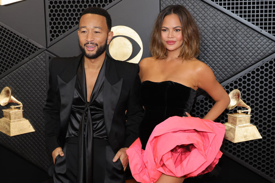 LOS ANGELES, CALIFORNIA - FEBRUARY 04: (FOR EDITORIAL USE ONLY) John Legend and Chrissy Teigen attend the 66th GRAMMY Awards at Crypto.com Arena on February 04, 2024 in Los Angeles, California. (Photo by Kayla Oaddams/WireImage)