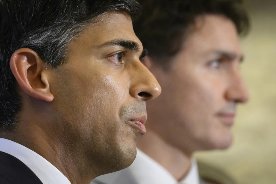 British Prime Minister Rishi Sunak, left, and Canadian Prime Minister Justin Trudeau hold a news conference at the G20 summit in Nusa Dua, Indonesia, Wednesday, Nov. 16, 2022. (Leon Neal/Pool Photo via AP)