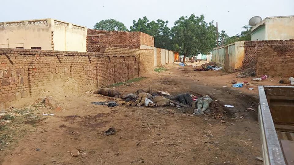 A picture taken on June 16, 2023, shows bodies strewn outdoors near houses in the West Darfur capital El Geneina.  - AFP/Getty Images