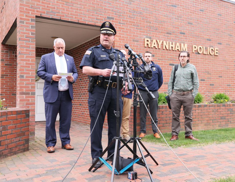 Raynham Police Chief David LaPlante, center, and Bristol County District Attorney Thomas Quinn, left, hold a press conference at the Raynham police station on Tuesday, April 30, 2024, after two Raynham police officers fatally shot a man who pointed a gun at them.
