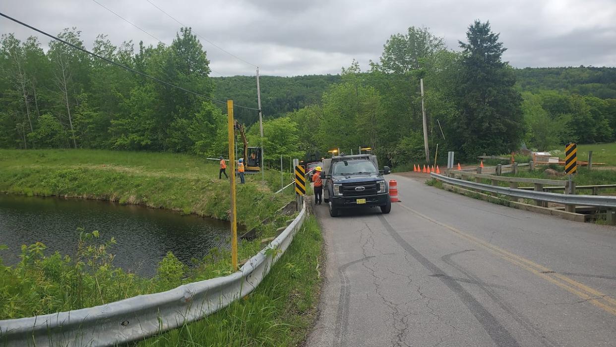 Nova Scotia Power attempted to cut off public access to White Rock canal earlier this month. The fence installation work has been halted and the provincial utility apologized at a public meeting on Thursday.  (Julie Harrington/Facebook  - image credit)