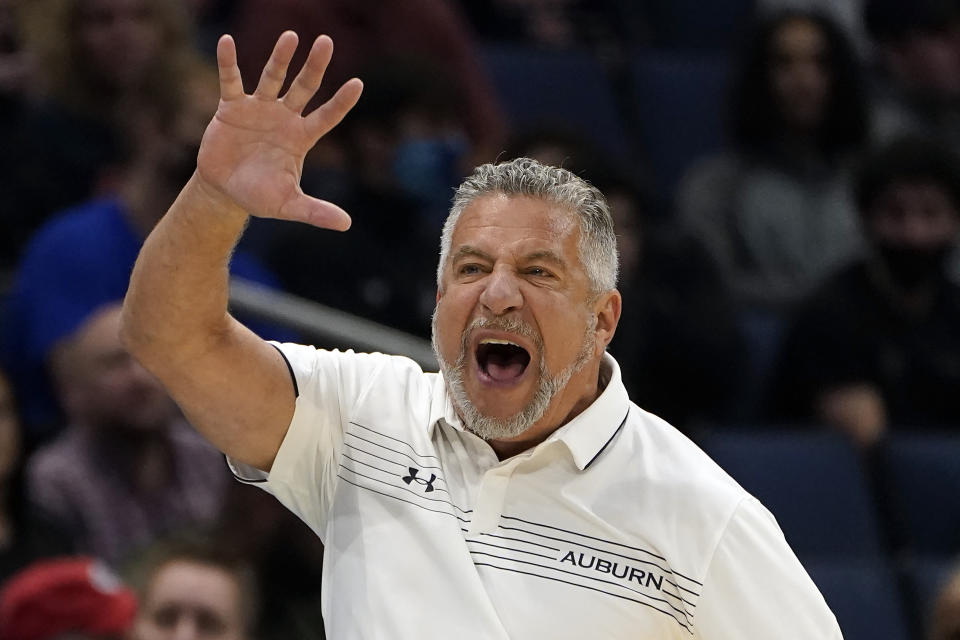 Auburn head coach Bruce Pearl calls a play during the first half of an NCAA college basketball game against South Florida Friday, Nov. 19, 2021, in Tampa, Fla. (AP Photo/Chris O'Meara)