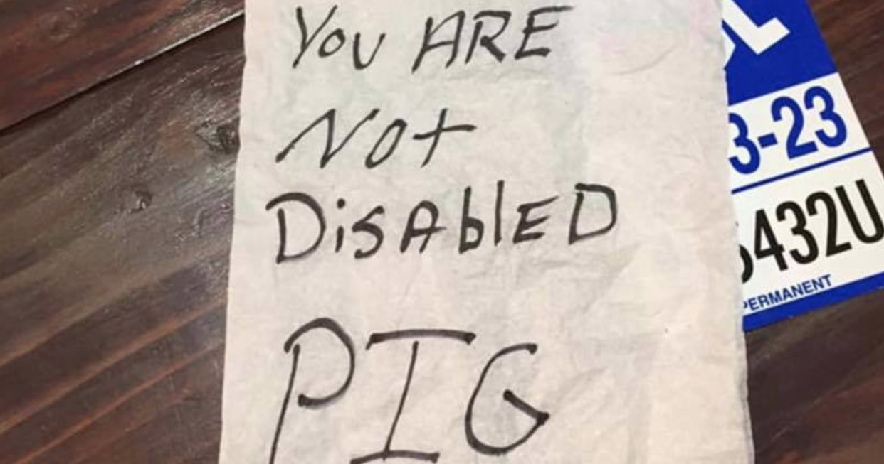 Police are looking for the person who left a note that reads “You are not disabled pig” on a disabled woman’s car. (Photo: Facebook)