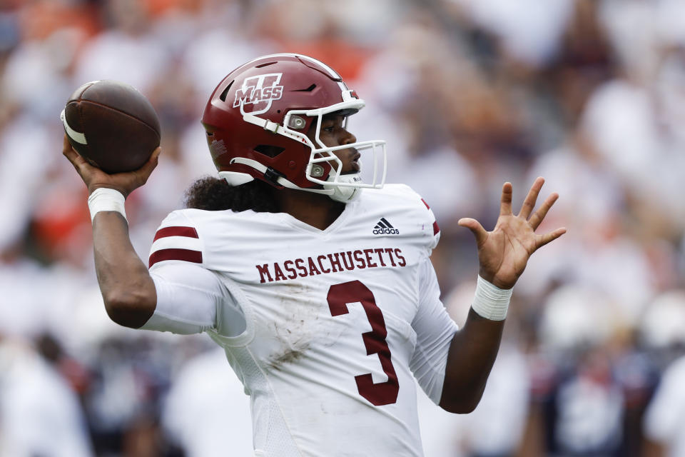 Massachusetts quarterback Taisun Phommachanh throws a pass against Auburn during the first half of an NCAA college football game Saturday, Sept. 2, 2023, in Auburn, Ala. (AP Photo/Butch Dill)