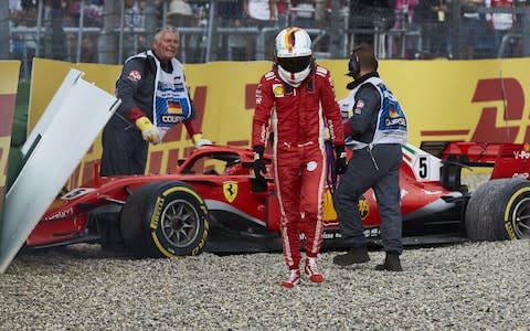 Sebastian Vettel of Germany and Ferrari walks from his car after crashing during the Formula One Grand Prix of Germany at Hockenheimring on July 22, 2018 in Hockenheim, Germany - Credit: getty images