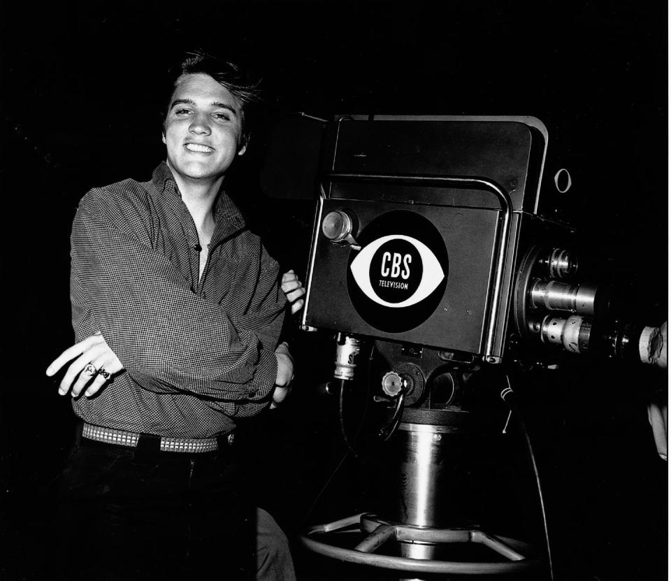 elvis poses by television camera