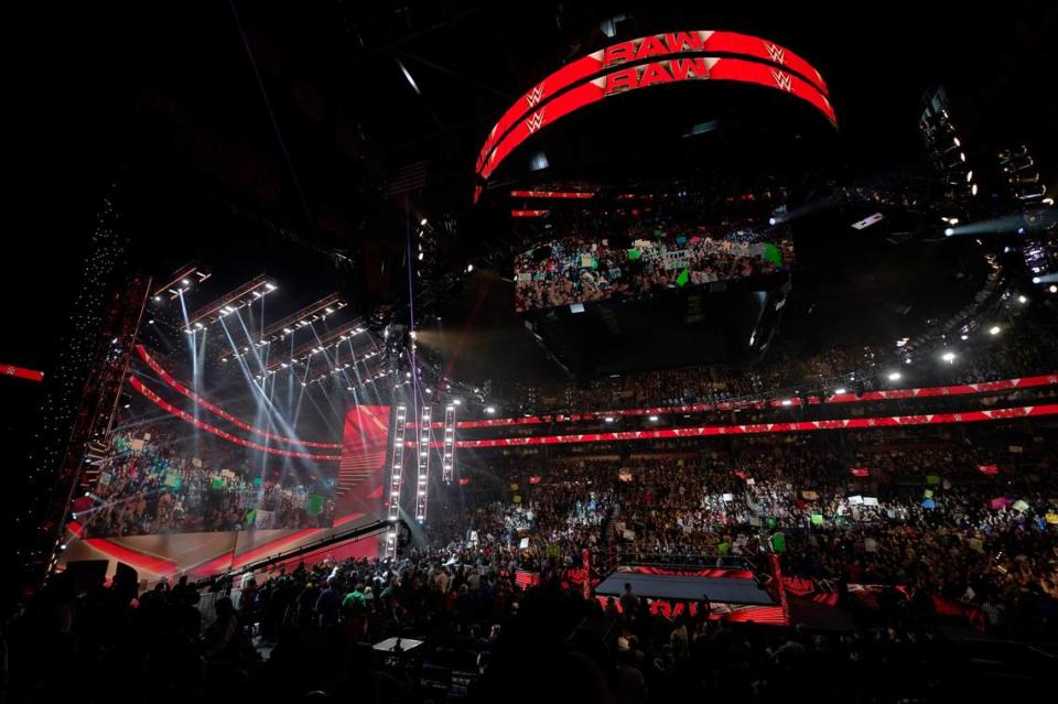 Bright lights illuminate the ring during the WWE “Monday Night RAW” event, Monday, March 6, 2023, in Boston. The RAW show started in 1993.