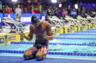 Michael Andrew reacts after winning the Men's 100 Breaststroke during wave 2 of the U.S. Olympic Swim Trials on Monday, June 14, 2021, in Omaha, Neb. (AP Photo/Jeff Roberson)