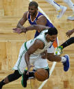 Boston Celtics center Tristan Thompson, below, is fouled by Phoenix Suns guard Chris Paul after he stole the ball from him in the first quarter of an NBA basketball game, Thursday, April 22, 2021, in Boston. (AP Photo/Elise Amendola)