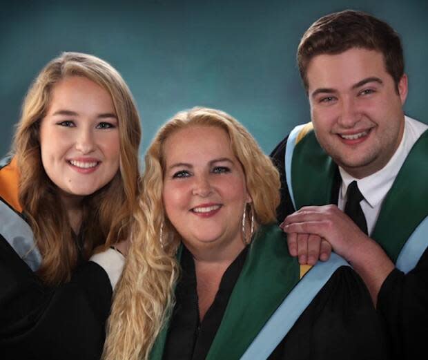 The Young family had their graduation portrait taken together. (Heckberts - image credit)