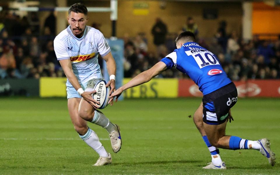 Nick David of Harlequins is tackled by Orlando Bailey during the Gallagher Premiership Rugby match between Bath Rugby and Harlequins - Getty Images