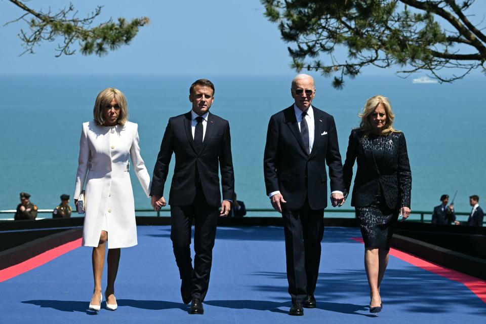 Joe Biden (2nd R) and US First Lady Jill Biden (R) walk with France's President Emmanuel Macron (2nd L) and his wife Brigitte Macron (AFP via Getty Images)