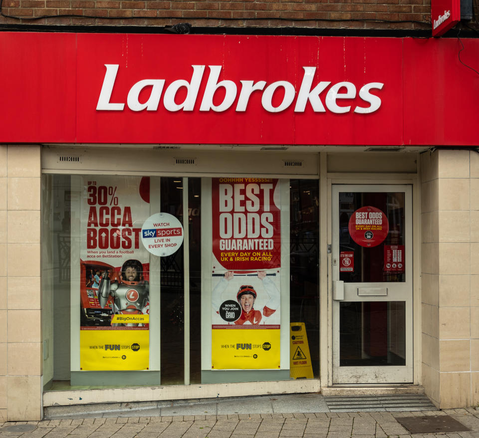 The entrance to Ladbrokes Bookmakers in Regent Street, Swindon, UK. Credit: Getty.