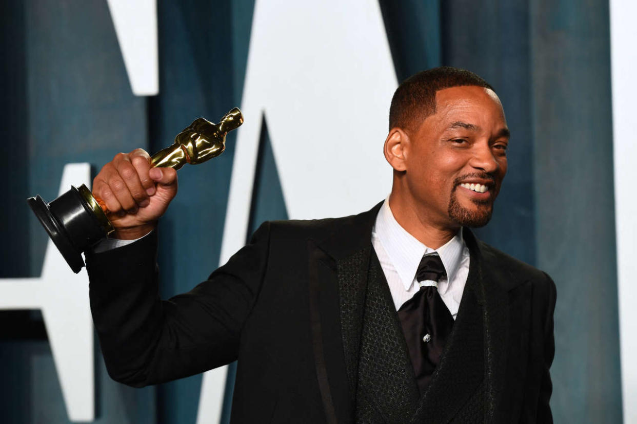 US actor Will Smith holds his award for Best Actor in a Leading Role for 