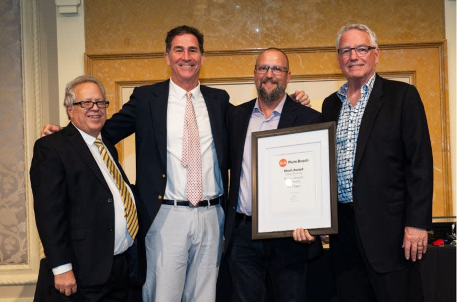 At its recent awards reception, AIA Palm Beach President Jorge Luaces, left, and Immediate Past President Bruce Retzsch, far right, presented a Merit Award for Urban Planning to architect Roger Janssen and project architect Jason Skinner of Dailey Janssen Architects for their work on the Via Flagler by The Breakers project in Palm Beach.