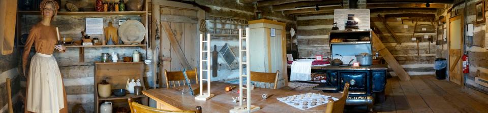 A panoramic interior photo of the 1860s Weinhold Log Cabin which is now at the Sheboygan County Historical Museum. The log home was moved in the 1970s from its original location in Adell to its spot at the museum.