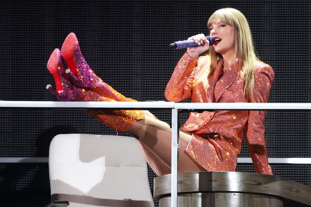 <p>Kevin Mazur/TAS24/Getty</p> Taylor Swift wearing Versace at the Eras Tour