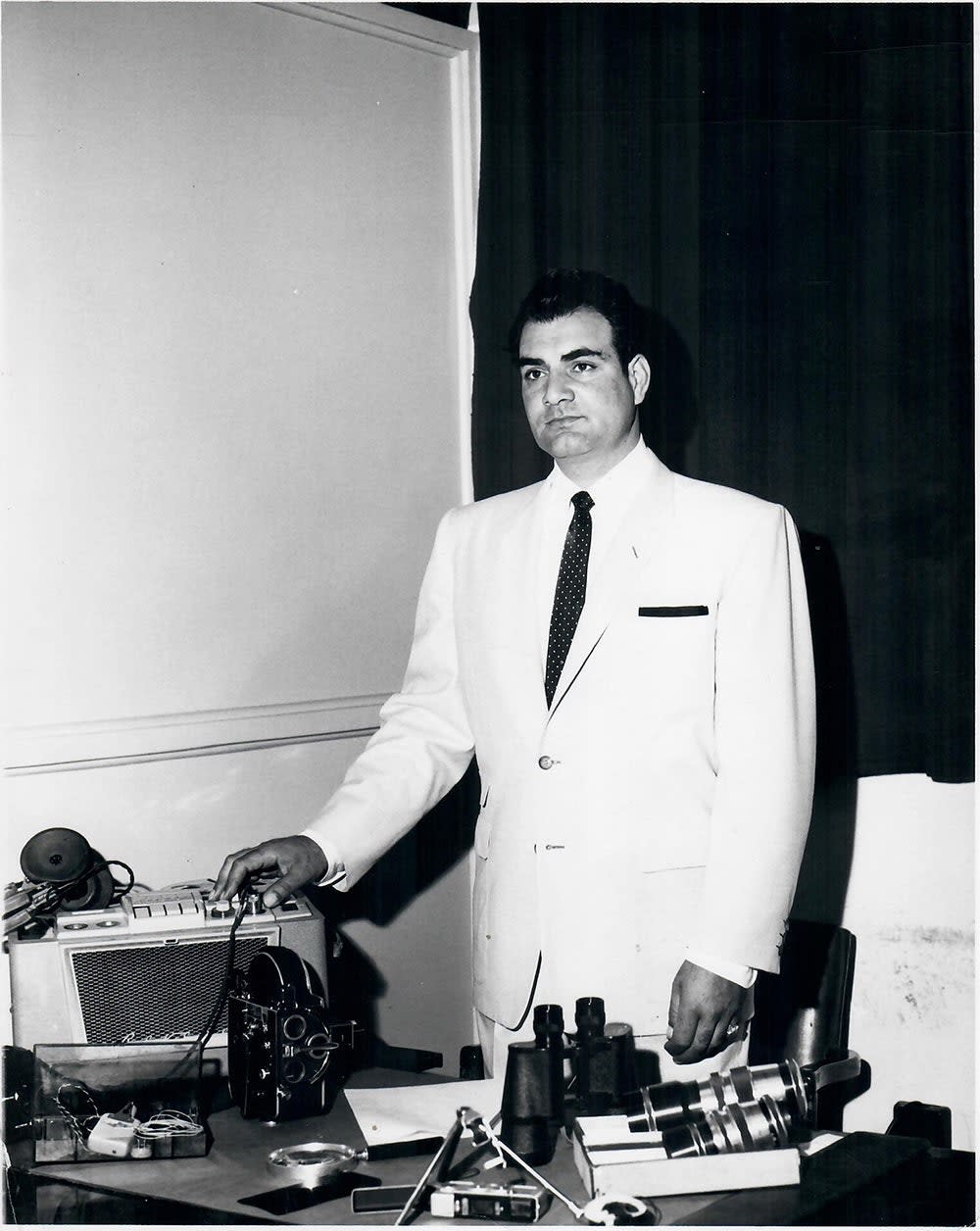 Fred Otash showcasing his wiretapping equipment