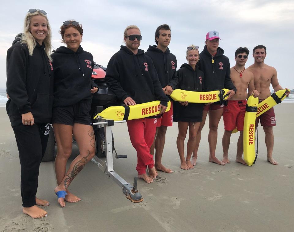 Ogunquit Ocean Rescue lifeguards include Annie Cyr, left, Alna Hallowell, Captain Adam Legg, Luca Miranda, Gracee Jordan, Will Thompson, Tobias Macedo and Aidan Danforth, seen Thursday, July 27, 2023. Some of them recently helped rescue six people from rip currents.