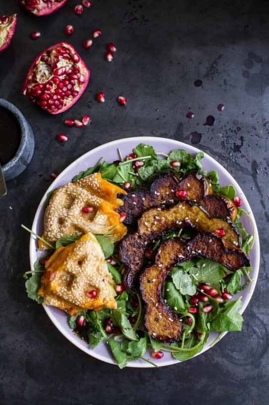 <p>Half Baked Harvest</p><p>Salty miso paste complements the maple, treacly sweetness of acorn squash incredibly well. </p><p><strong>Get the recipe: <a href="https://www.halfbakedharvest.com/miso-roasted-acorn-squash-pomegranate-salad-wwaffled-cheddar-apple-tahini-grilled-cheese-triangles/" rel="nofollow noopener" target="_blank" data-ylk="slk:Miso Roasted Acorn Squash Pomegranate Salad;elm:context_link;itc:0;sec:content-canvas" class="link ">Miso Roasted Acorn Squash Pomegranate Salad</a></strong></p>
