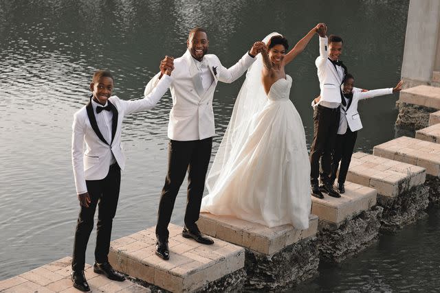 © Bob Metelus Dwyane Wade and Gabrielle Union on their wedding day with his kids and nephew in 2014.