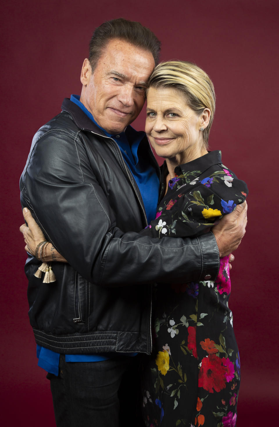 This Oct. 26, 2019 photo shows actor Arnold Schwarzenegger, left, and actress Linda Hamilton posing for a portrait to promote the film, "Terminator: Dark Fate" at the Four Seasons Hotel Los Angeles at Beverly Hills in Los Angeles. (Photo by Willy Sanjuan/Invision/AP)