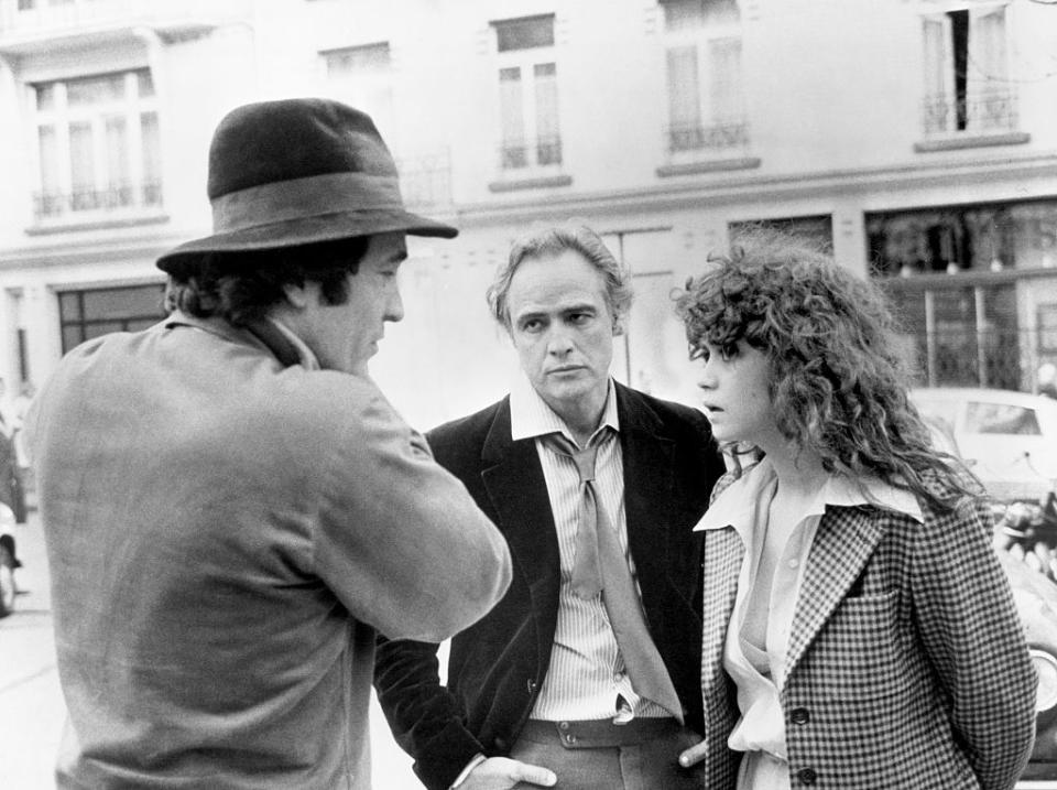 Regisseur Bernardo Bertolucci (l.) am Set mit Marlon Brando und Maria Schneider. (Bild: Getty Images)