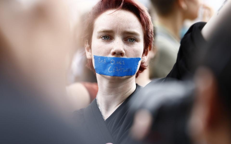 An abortion rights demonstrator outside the US Supreme Court in Washington - Samuel Corum/Bloomberg