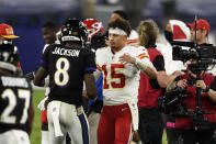 Baltimore Ravens quarterback Lamar Jackson (8) and Kansas City Chiefs quarterback Patrick Mahomes (15) embrace after an NFL football game Monday, Sept. 28, 2020, in Baltimore. The Chiefs won 34-20. (AP Photo/Gail Burton)