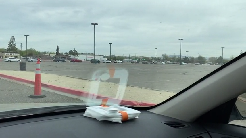 A nearly hour long line of cars waiting for COVID-19 testing at the Washoe County Health District drive-thru testing site.