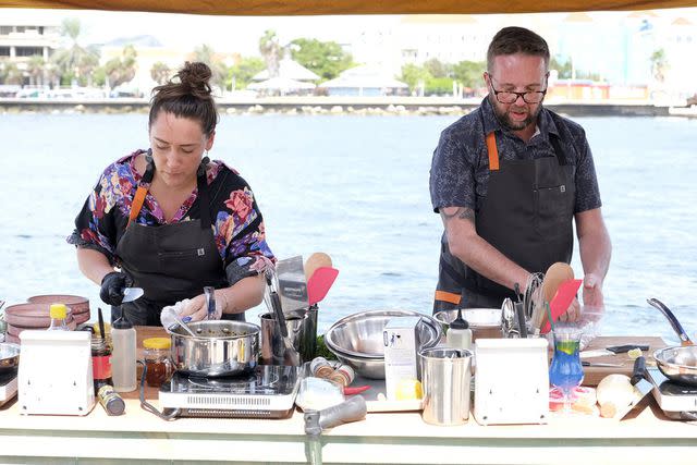 <p>David Moir/Bravo</p> Savannah Miller and Dan Jacobs cook in the 'Top Chef: Wisconsin' final quickfire challenge