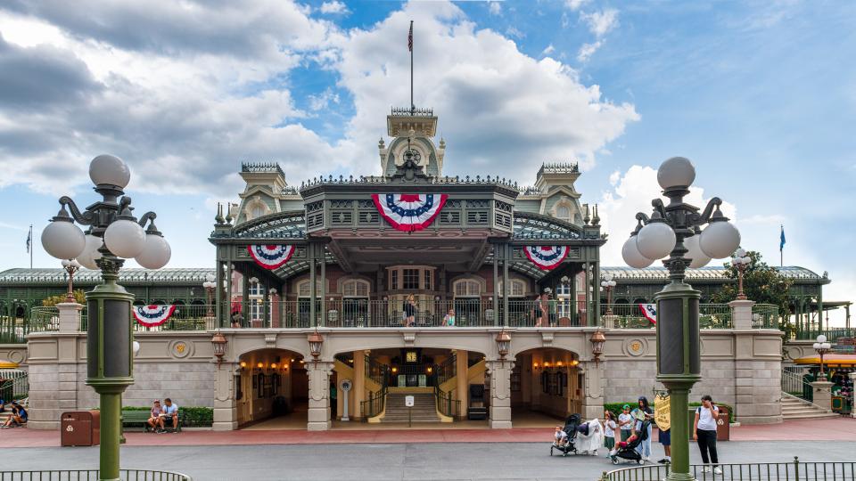 Symmetric view of the Train Station at the entrance of at Walt Disney World's Magic Kingdom amusement park.