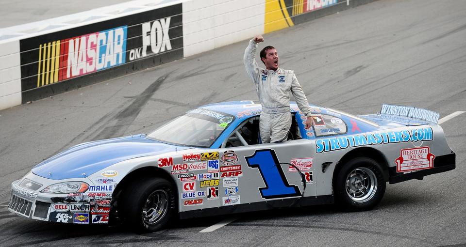 MARTINSVILLE, VA - OCTOBER 09: Lee Pulliam, driver of the #1 Pulliam Racing Chevrolet, celebrates after winning the running of the NASCAR Virginia Is For Racing Lovers 300 Late Model Stock race at Martinsville Speedway on October 9, 2011 in Martinsville, Virginia. (Photo by Jared C. Tilton/Getty Images for NASCAR) *** Local Caption *** Lee Pulliam