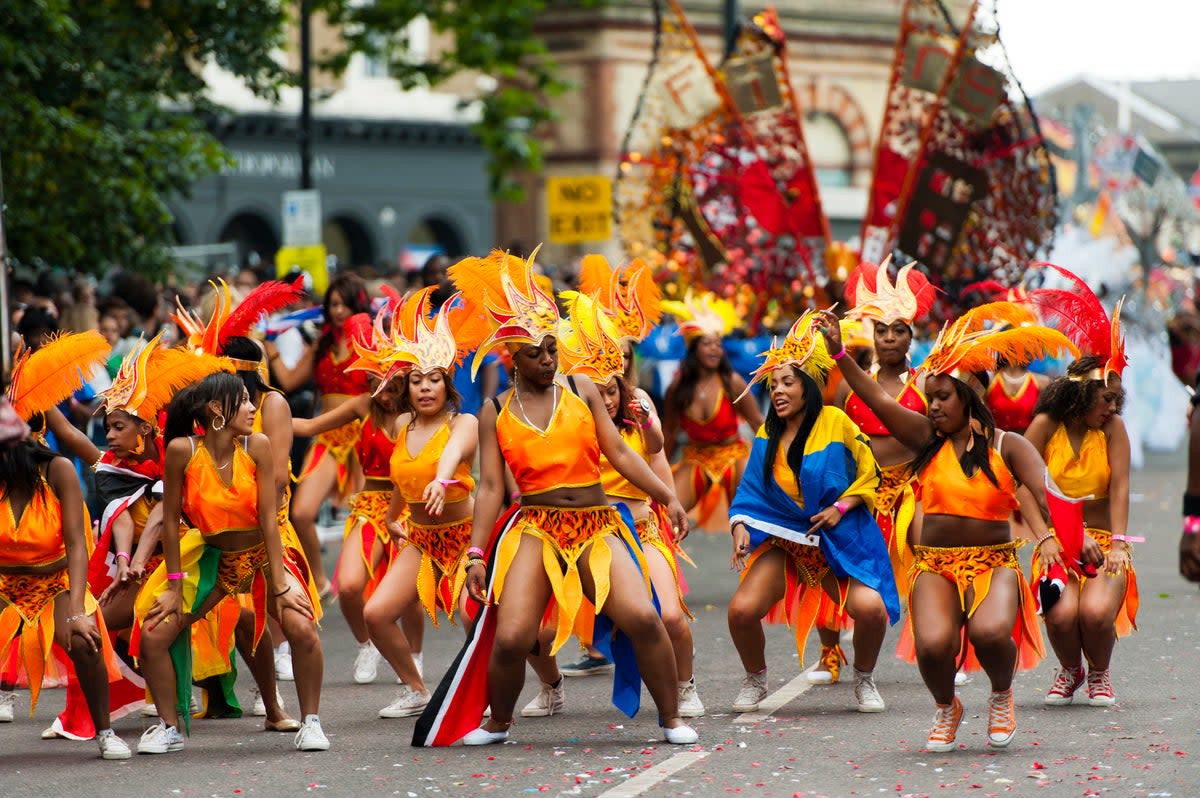 Samba and strut with the parade dancers in W11 (Getty Images)