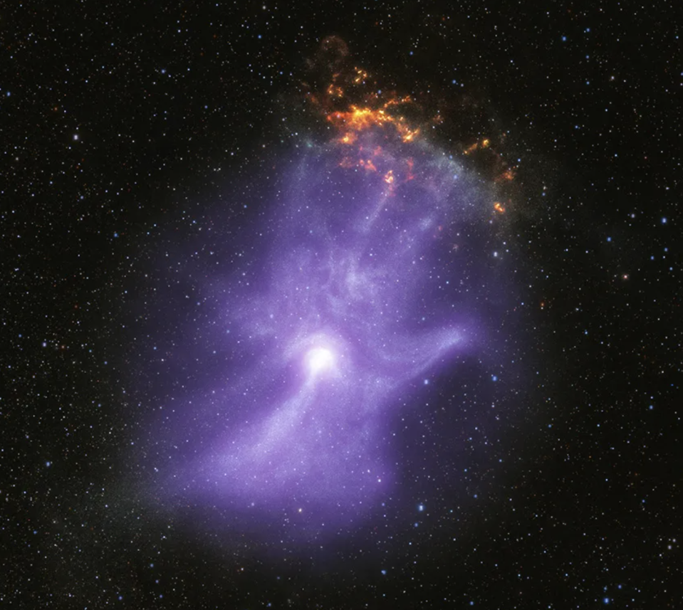 The shape of a ghostly cosmic hand.  / Credit: NASA
