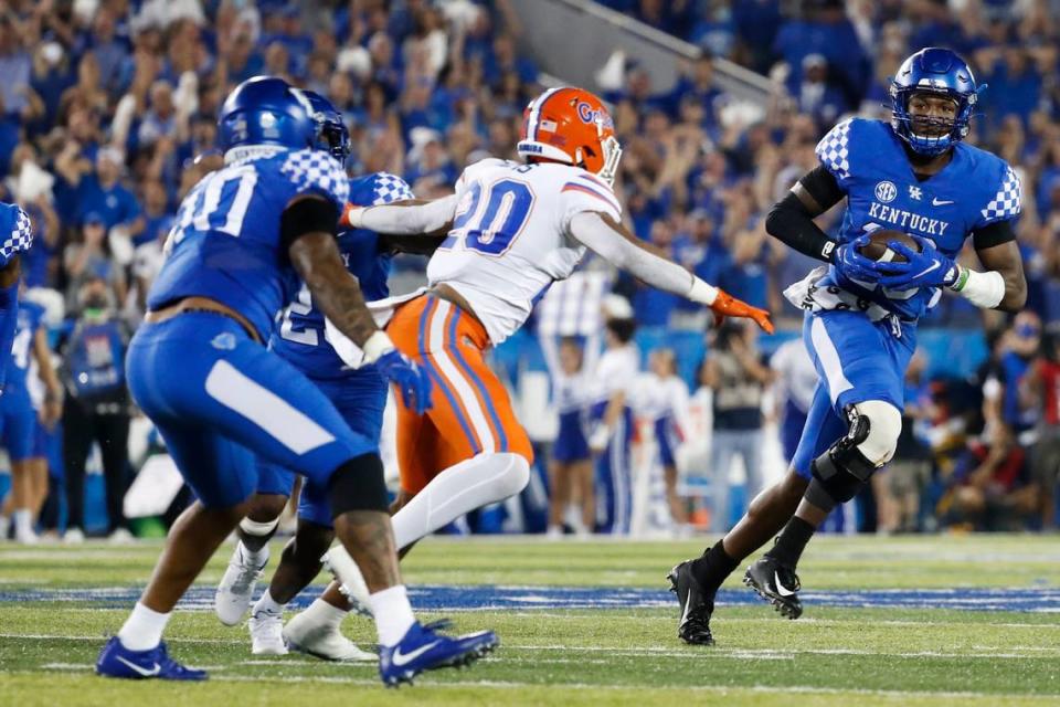 An interception by Kentucky’s J.J. Weaver (13) set up a short-field touchdown and was a big play in UK’s 20-13 upset of No. 10 Florida two seasons ago at Kroger Field.