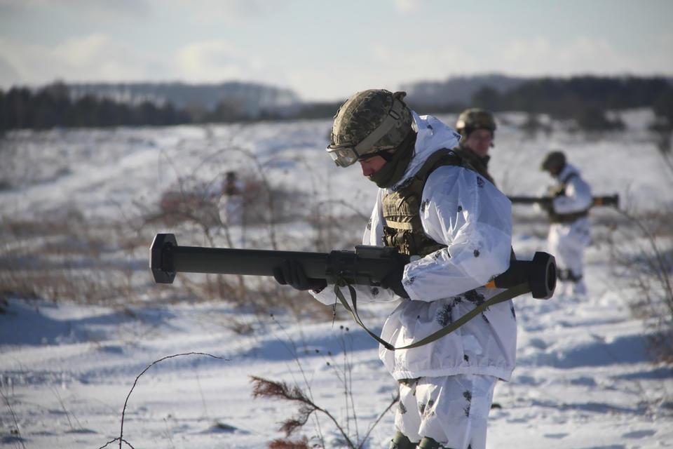 In this photo provided by the Ukrainian Defense Press Service and taken on Jan. 30, 2022, a Ukrainian soldier trains using the US M141 Bunker Defeat Munition (SMAW-D) missiles at the Yavoriv military training ground, close to Lviv, western Ukraine. (Ukrainian Defense Ministry Press Service via AP)