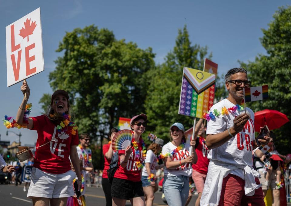 Members from the Canadian embassy and community march down the road during the Capital Pride Festival in Washington, DC, on June 10, 2023 (AFP via Getty Images)